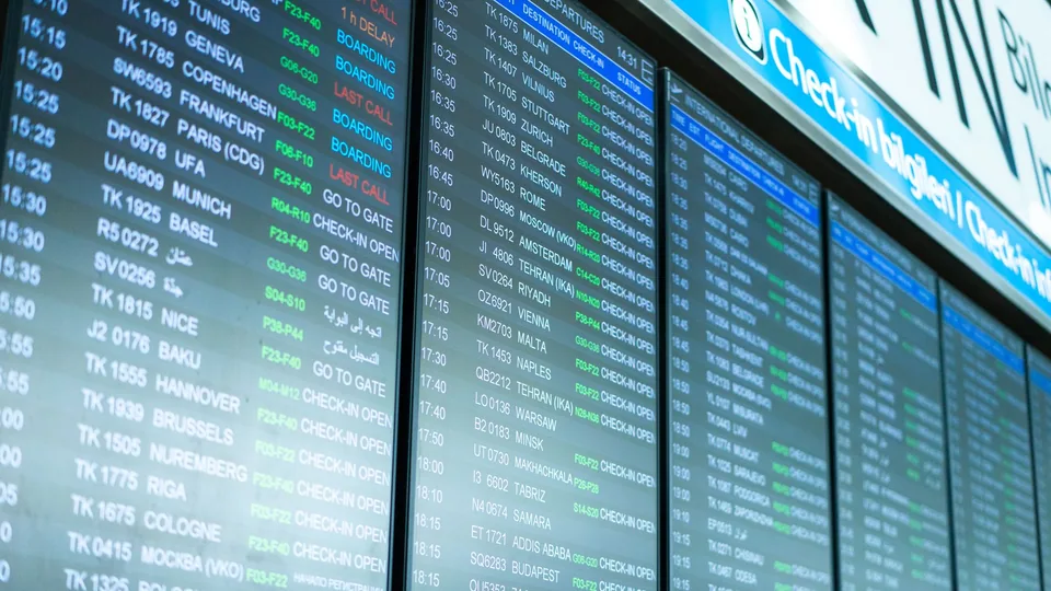 Airport departure board representing a confirmed onward journey through China