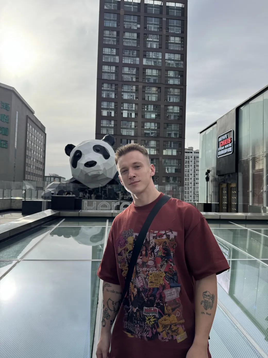 Your host on a rooftop overlooking the Shenzhen skyline