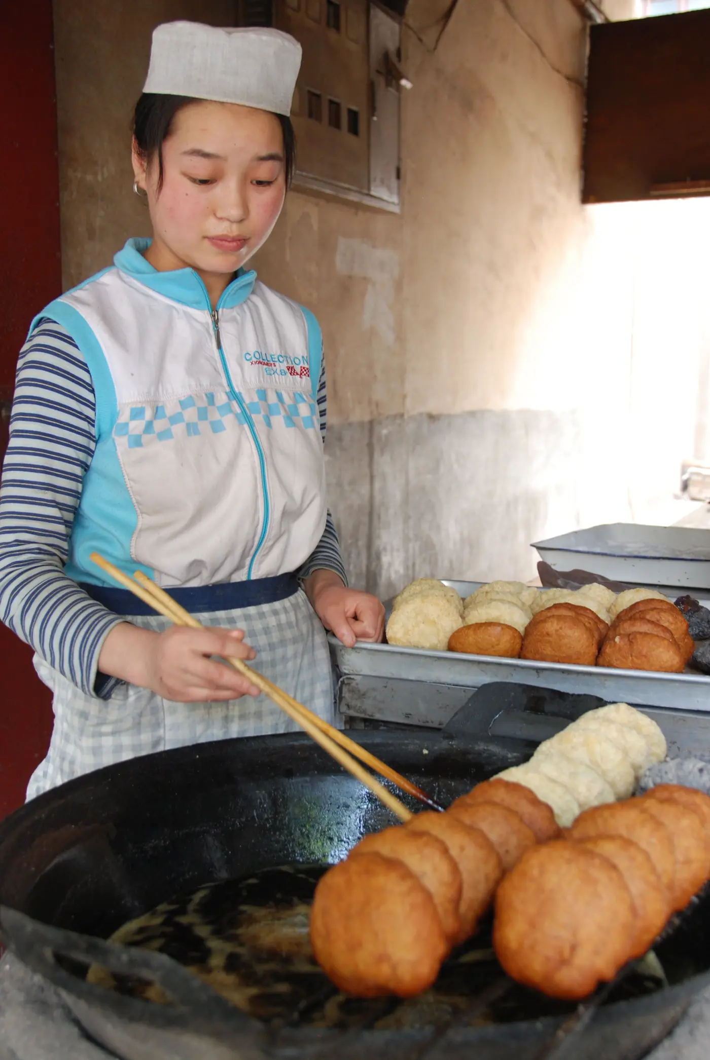 Street-food stall in China where mobile QR payment is commonly used