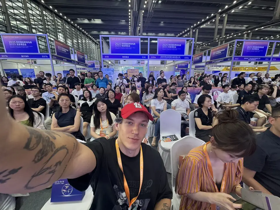Business visitors meeting exhibitors at an international trade fair in China